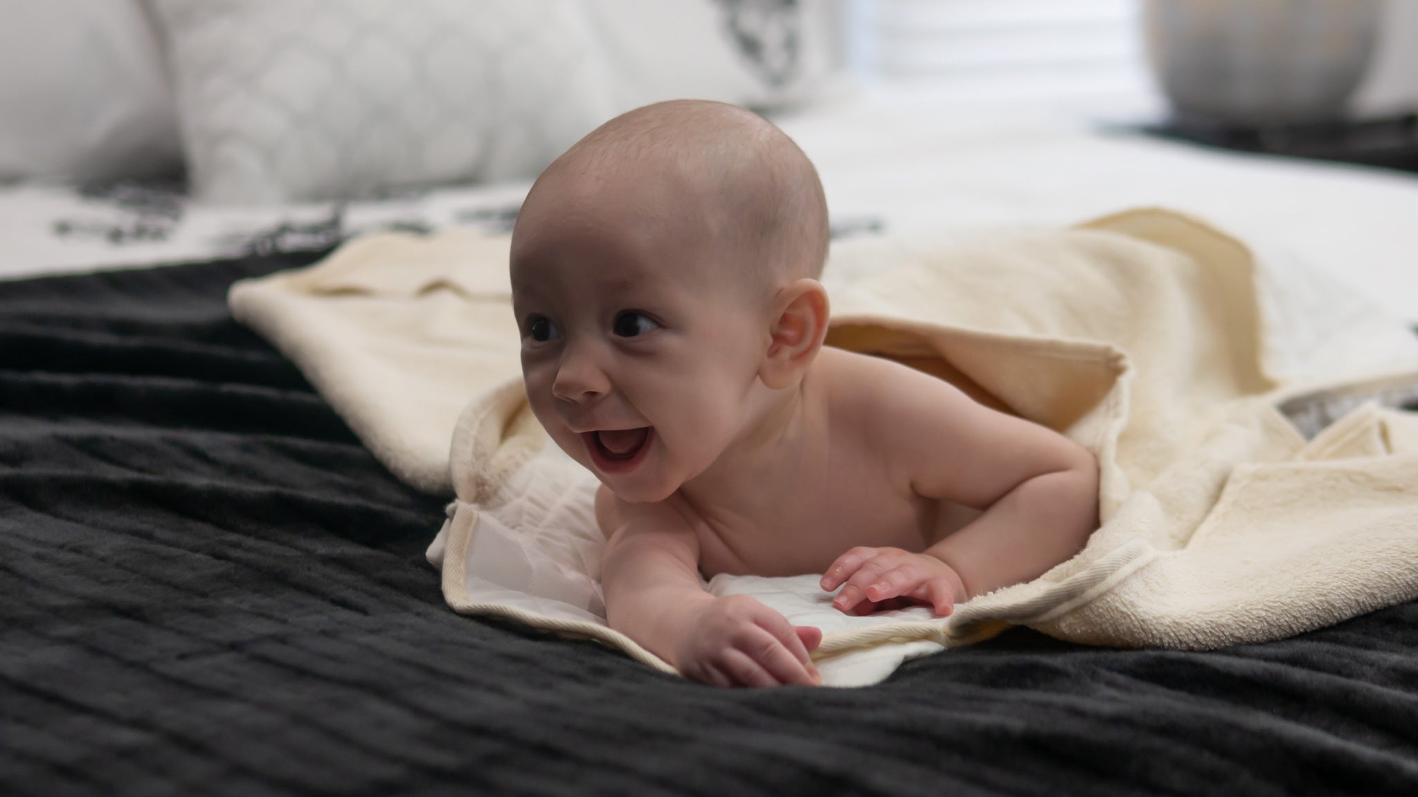 BoraBaby baby in baby bath towel on bed banner